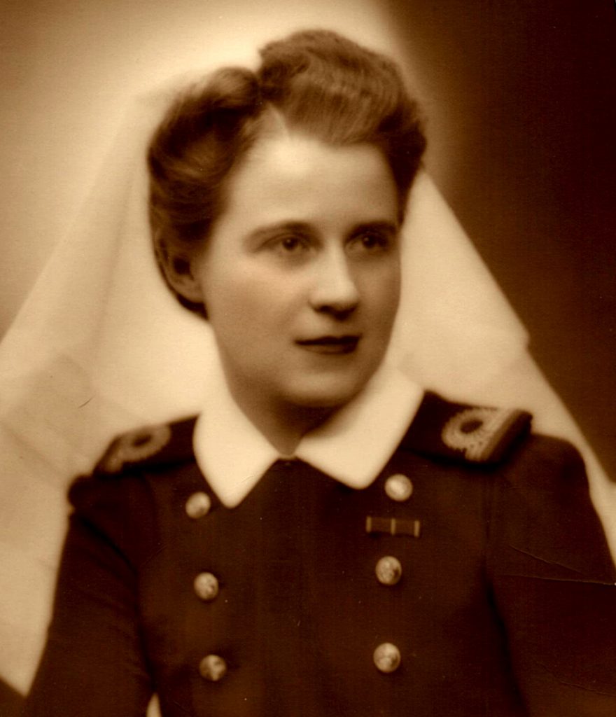 A young woman in naval officer's uniform