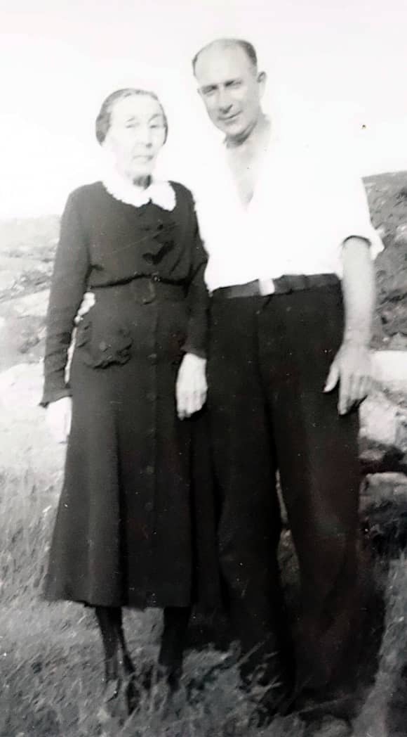 William Currie and mother Cassie Brown standing outside