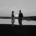 A Couple in Front of a Lake at the Blais Farm, Saint-Marc-de-Figuery in Abitibi