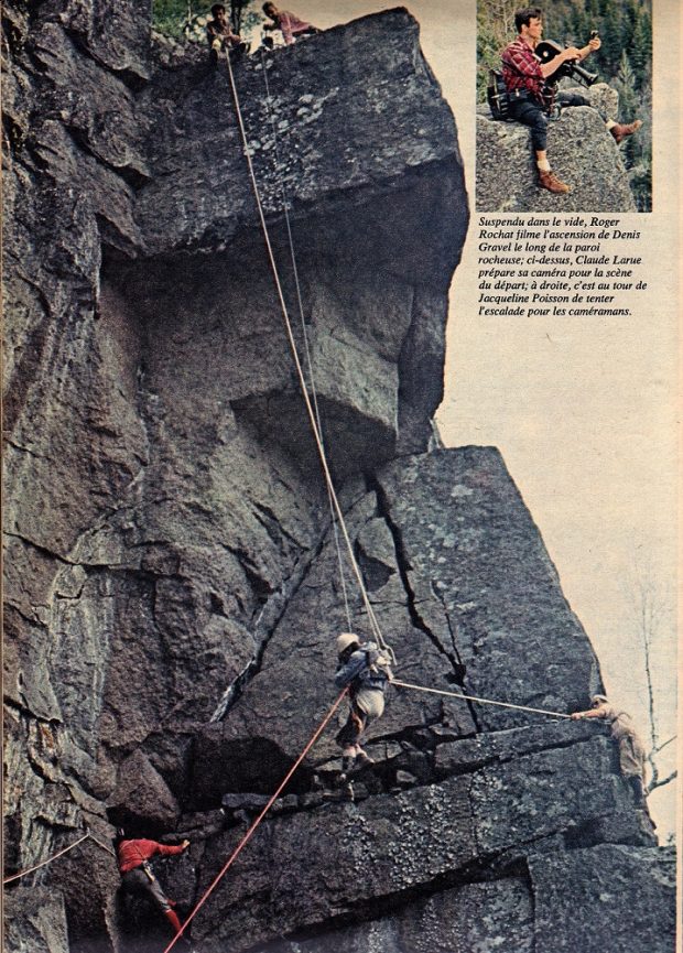 Extract from a magazine: a cameraman atop a rock is filming a climber suspended in mid-air by ropes held by three people.