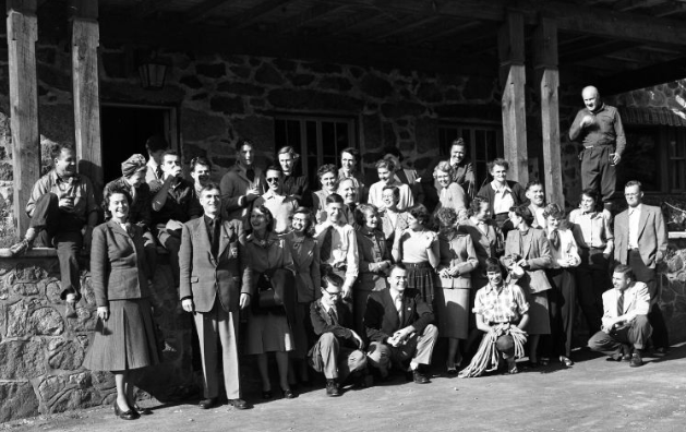 A group of some 40 people from the Montreal section of the Alpine Club of Canada photographed in front of La Sapinière Hotel in 1952.