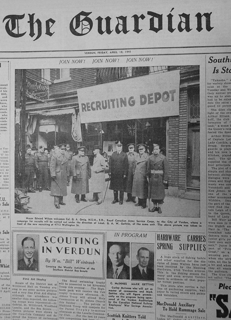Black and white photograph. Seven men, wearing long coats and military caps, standing in front of a building with a big sign that reads “Recruiting Depot.” Photograph titled “Join Now, Join Now, Join Now,” followed by a short text.