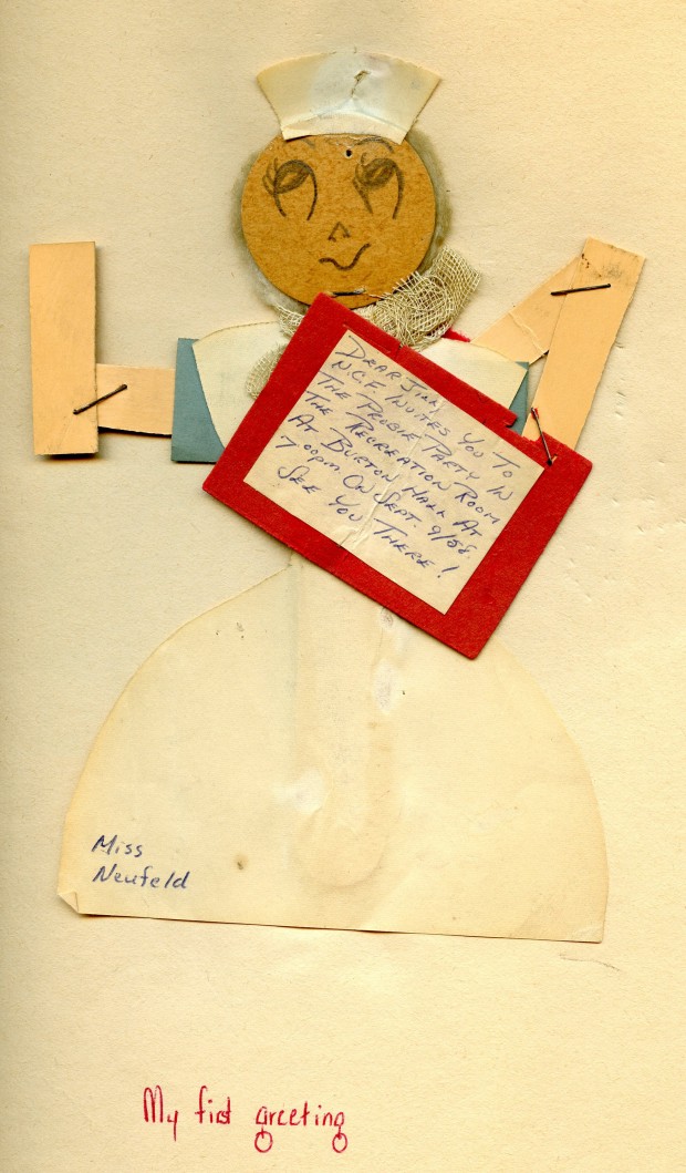 A paper doll of a nurse holds an invitation.