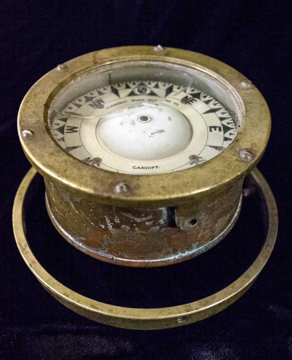 brass navigational compass recovered from shipwreck