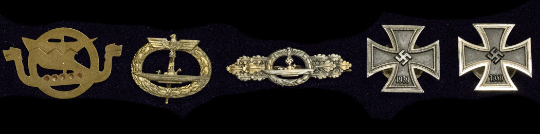 five German Navy U-boat badges and medals