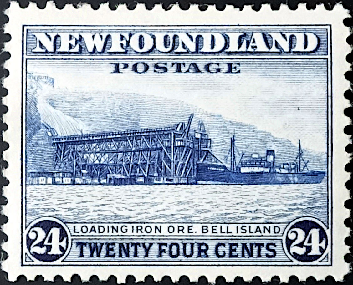 Newfoundland postage stamp showing a ship loading iron ore at Bell Island loading pier