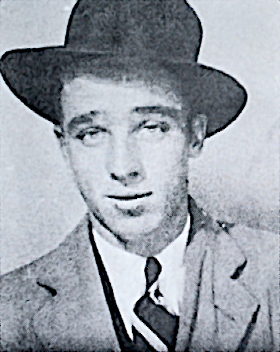 old newspaper photo of a young man wearing a fedora, suit and coat