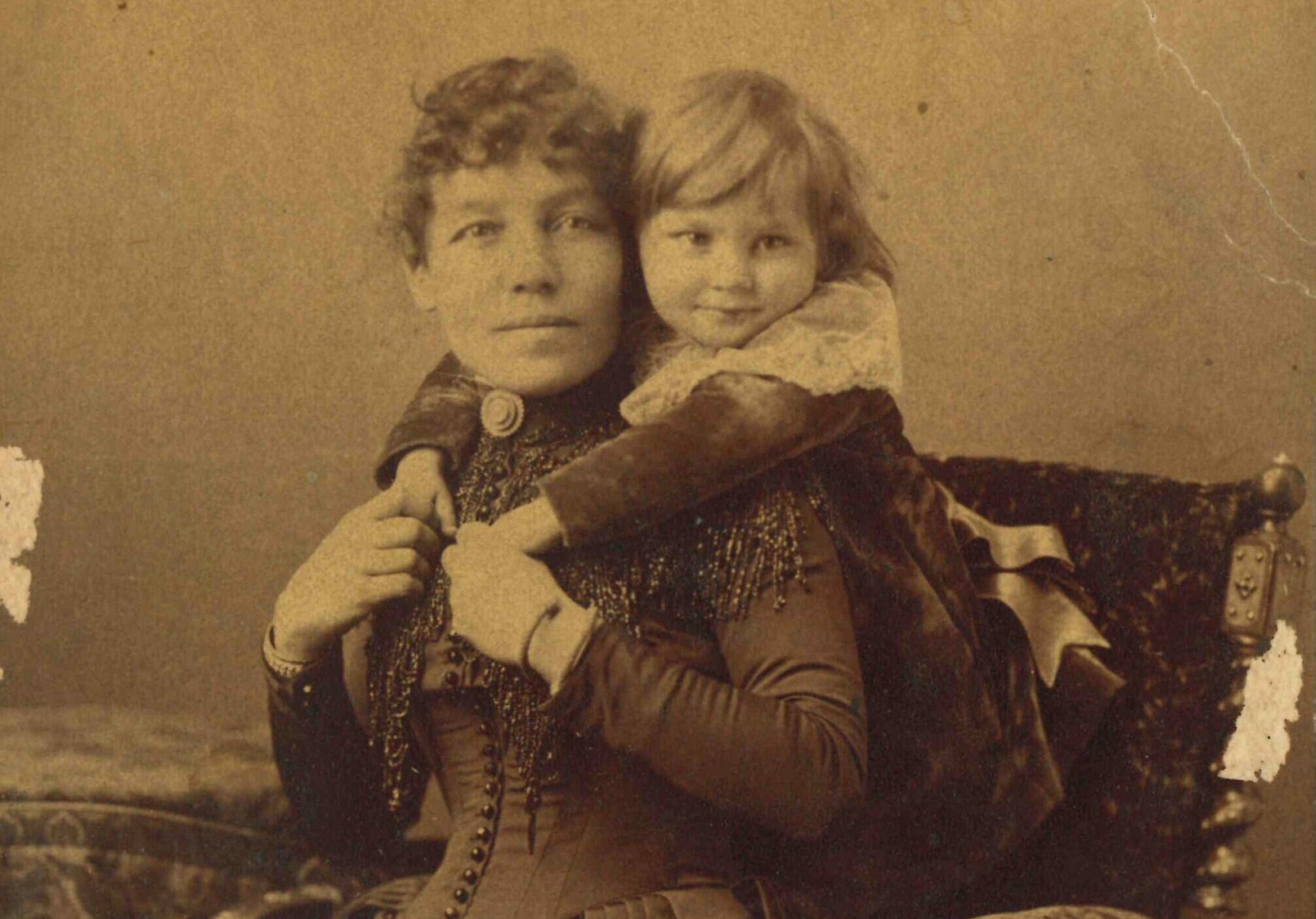 Photo of Isabella Lougheed with their eldest son, Clarence, at approximately 2 years old, c.1887.