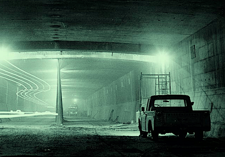 A truck parked inside a tunnel