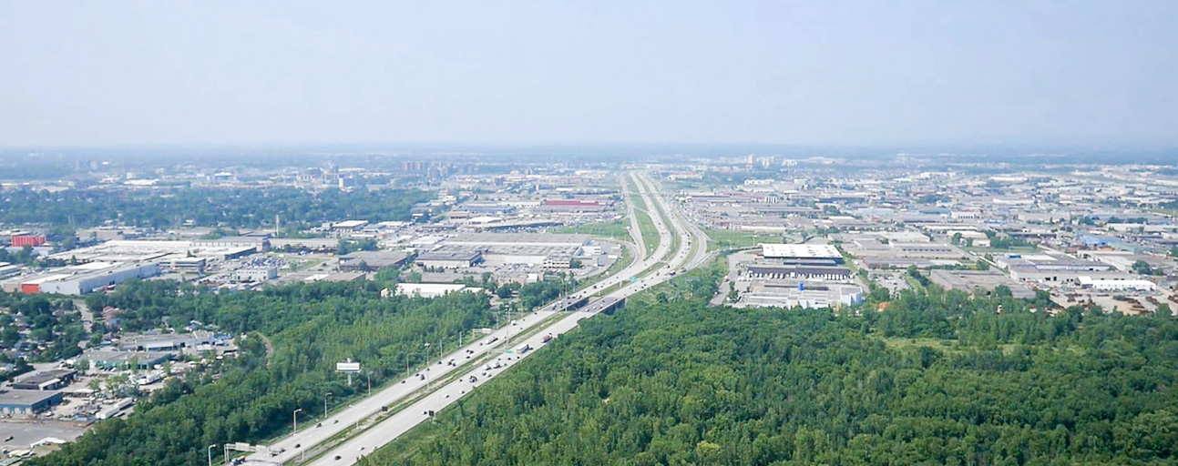 Aerial colour photograph: View of Jean-Noël Lavoie Highway and the industrial sector of Laval.