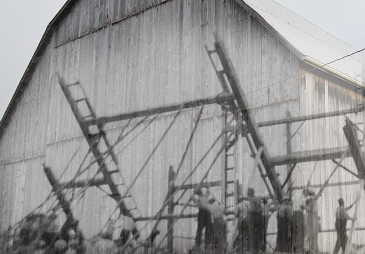 A contemporary photograph of a bank barn with a superimposed image of the work bee that raised it.