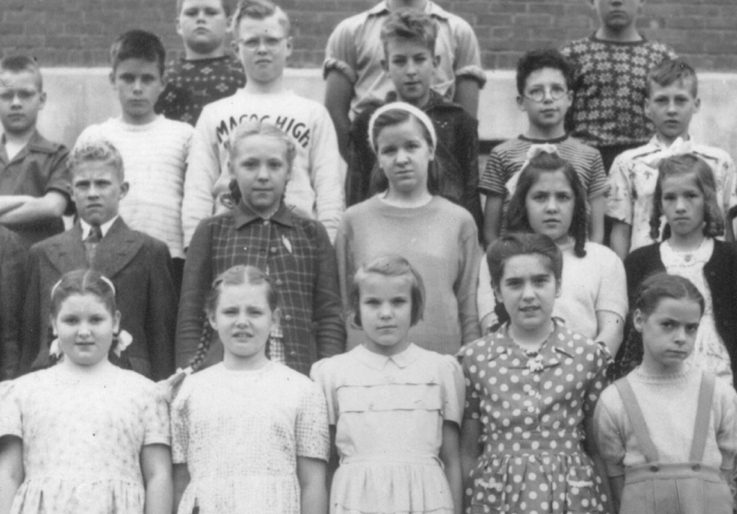 Black and white photo of school children