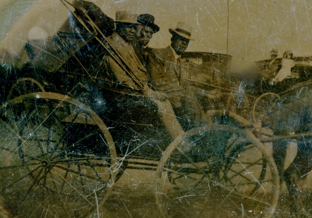 Tin photo circa 1900 depicting Solomon Kendall 2nd alongside one Black man and white man in a horse drawn carriage